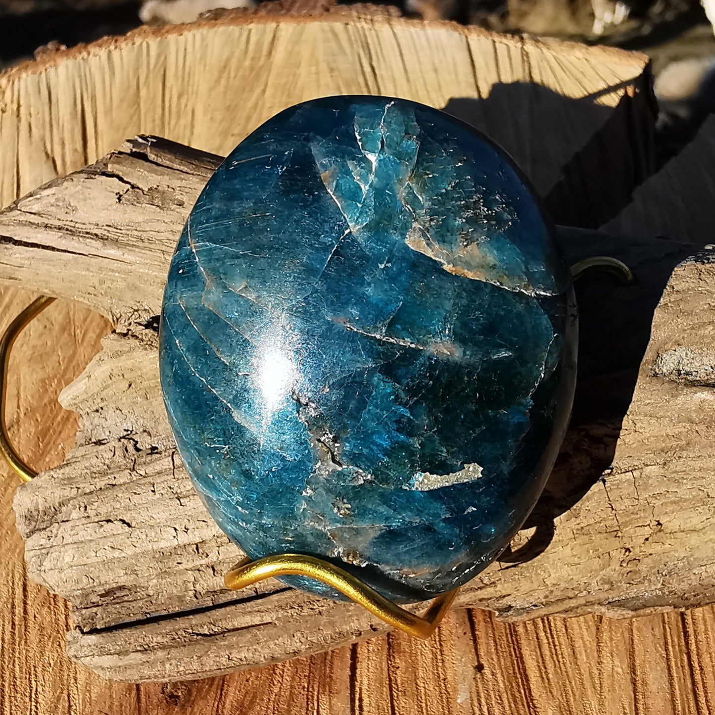 Apatite tumbled stone drilled including leather strap