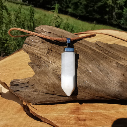Barite pendant drilled with leather cord